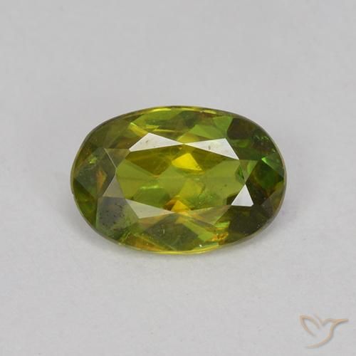 0.60ct Natural Verde terroso cálido esfena, Ovalada, VVS-VS
