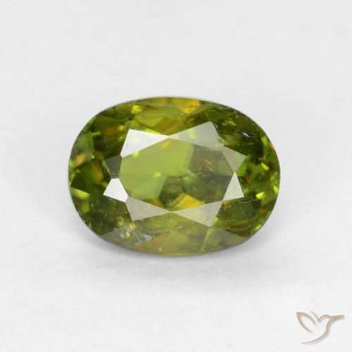 0.65ct Natural Verde terroso cálido esfena, Ovalada, SI