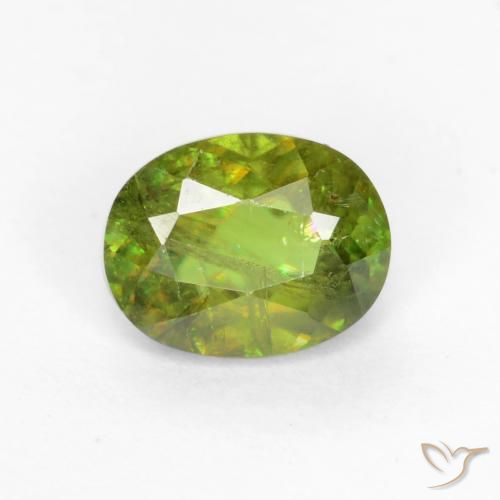 0.66ct Natural Verde bosque esfena, Ovalada, SI