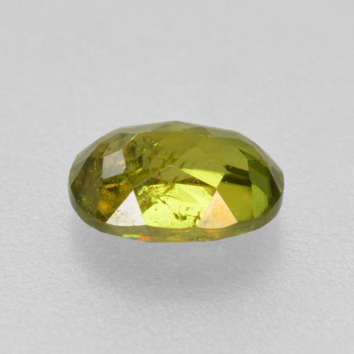 Esfena verde natural de 0,54 ct, corte óvalo, VS-SI
