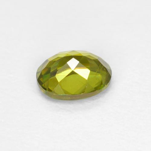 Esfena verde natural de 0,46 ct, corte óvalo, VS