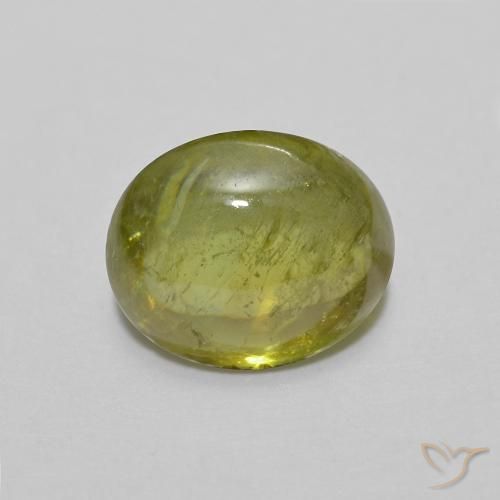 1.35ct Natural Verde bosque cálido esfena, Ovalada, Transparente