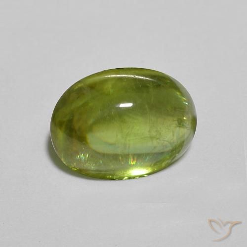 esfena Medium Dark-Green natural de 1.31 ct, Ovalada, Transparente