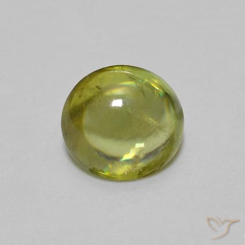 0.94ct Natural Verde bosque cálido esfena, Ovalada, Transparente