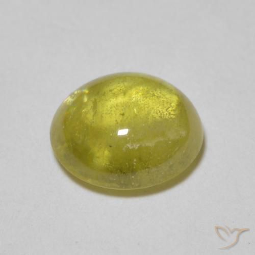 esfena Marrón verde dorado natural de 1.25 ct, Ovalada, Transparente