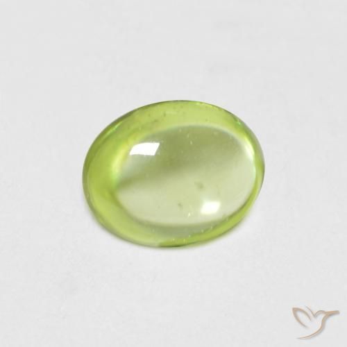 0.57ct Natural Verde amarillento intenso esfena, Ovalada, Transparente