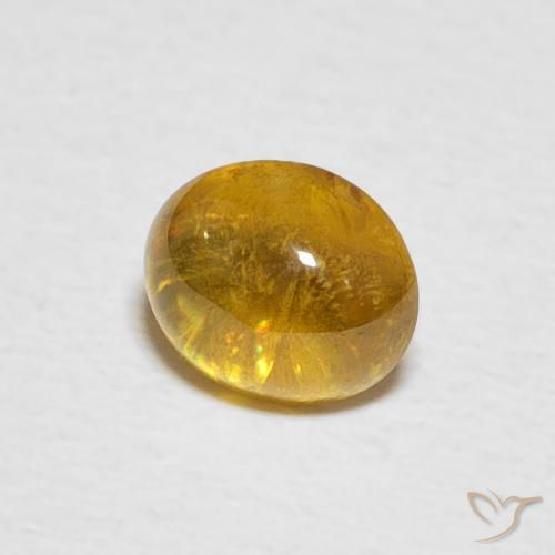 esfena Marrón amarillento natural de 1.02 ct, Ovalada, Transparente