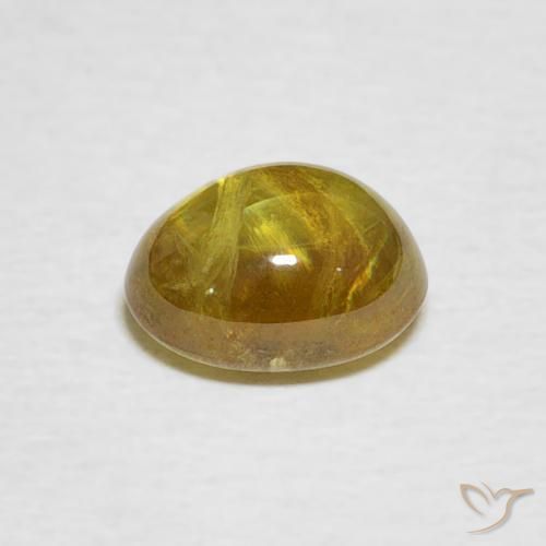 esfena Amarillo amarronado natural de 1.58 ct, Ovalada, Transparente