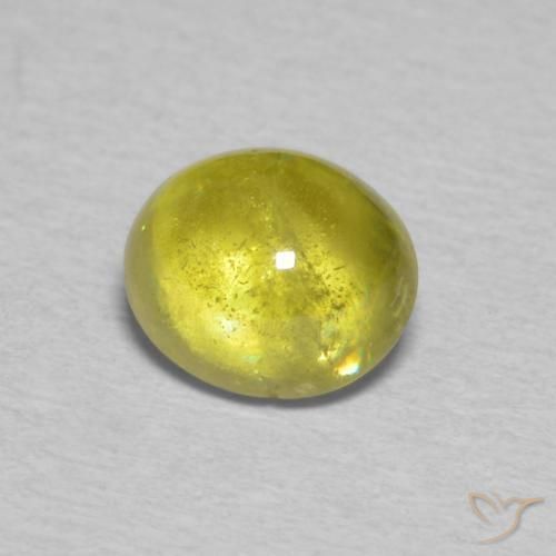 esfena Verde amarillento natural de 1.53 ct, Ovalada, Transparente