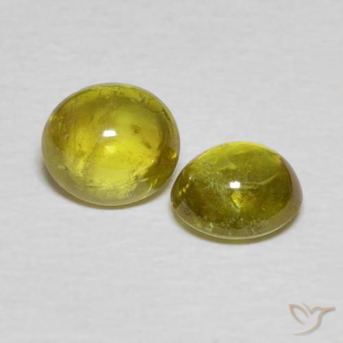 Gemas de esfena Marrón dorado intenso natural de 1.76 ct, Ovalada, Transparente