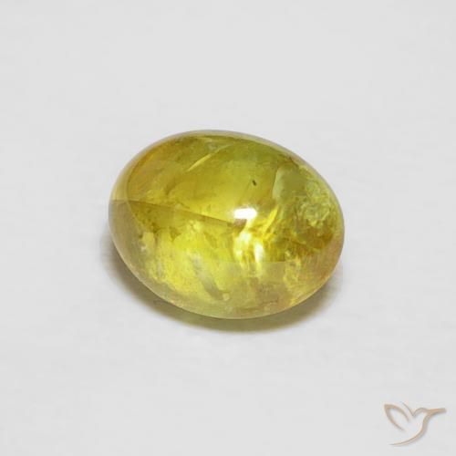 esfena Amarillo amarronado natural de 0.94 ct, Ovalada, Transparente