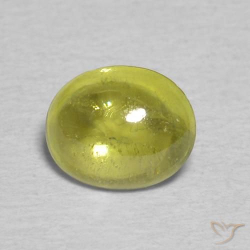 0.75ct Natural Verde terroso cálido esfena, Ovalada, Transparente