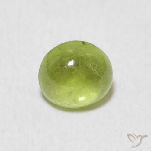 0.69ct Natural Verde claro esfena, Ovalada, Transparente