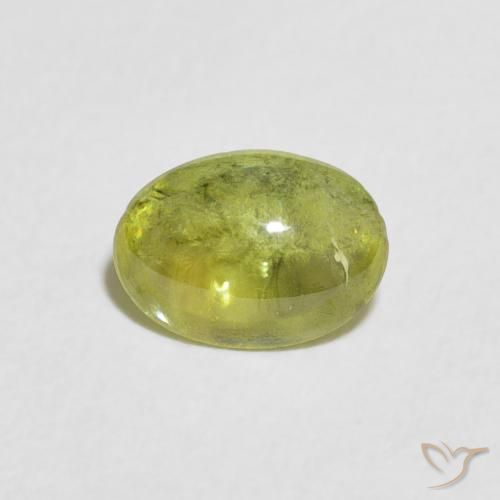 1.10ct Natural Verde bosque cálido esfena, Ovalada, Transparente