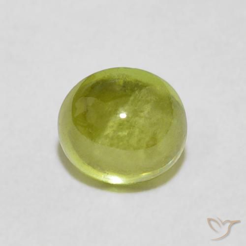 1.39ct Natural Verde terroso cálido esfena, Ovalada, Transparente