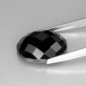 Espinela negro natural de 11,93 ct, corte óvalo, opaco