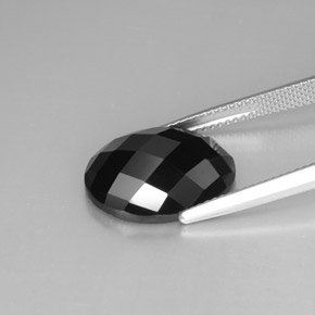 Espinela negro natural de 10,83 ct, corte óvalo, opaco