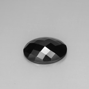 Espinela negro natural de 8,80 ct, corte óvalo, opaco