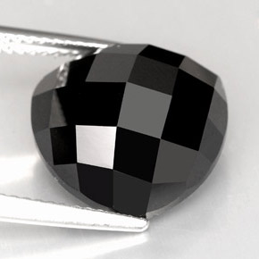 Espinela negro natural de 11,09 ct, trillón, opaco