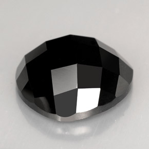 Espinela negro natural de 11,09 ct, trillón, opaco