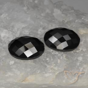 Gemas de Espinela Negro natural de 23.18 ct, Ovalada, Opaco