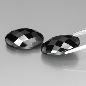 Gemas de espinela negro natural de 24,58 ct, corte óvalo, opaco