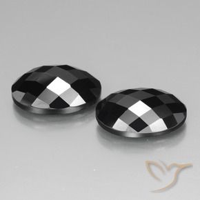 Gemas de Espinela Negro natural de 26.87 ct, Ovalada, Opaco
