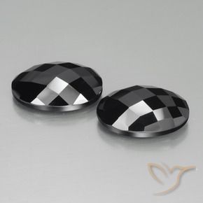 Gemas de Espinela Negro natural de 25.08 ct, Ovalada, Opaco