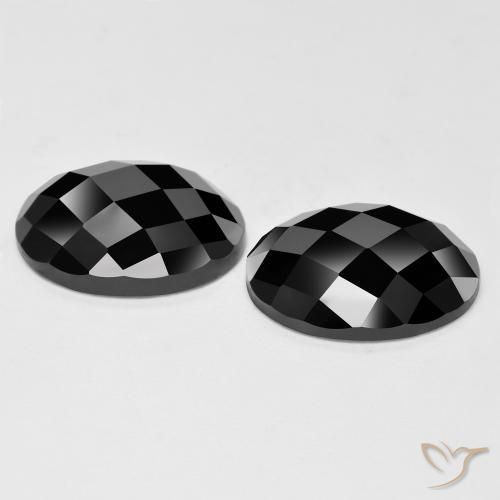 Gemas de Espinela Negro natural de 22.77 ct, Ovalada, Opaco