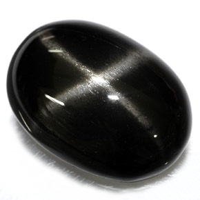 Diopsido estrella negro natural de 26,40 ct, corte óvalo, opaco