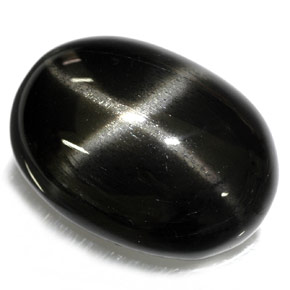 Diopsido estrella negro natural de 26,40 ct, corte óvalo, opaco