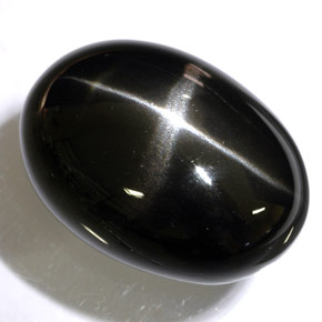 Diopsido estrella negro natural de 48,47 ct, corte óvalo, opaco