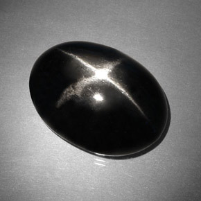 Diopsido estrella negro natural de 37,46 ct, corte óvalo, opaco