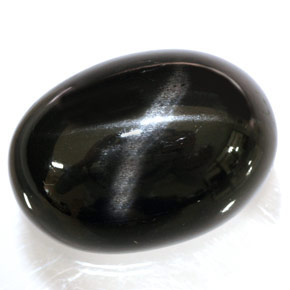 Diopsido estrella negro natural de 34,95 ct, corte óvalo, opaco