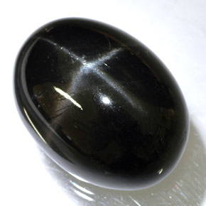 Diopsido estrella negro natural de 24,45 ct, corte óvalo, opaco