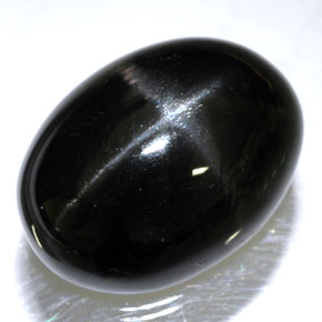 Diopsido estrella negro natural de 24,45 ct, corte óvalo, opaco