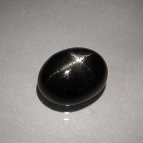 Diopsido estrella negro natural de 4,13 ct, corte óvalo, opaco