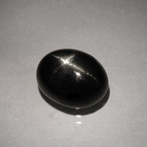Diopsido estrella negro natural de 4,13 ct, corte óvalo, opaco