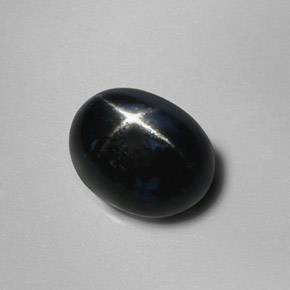 Diopsido estrella negro natural de 2,88 ct, corte óvalo, opaco
