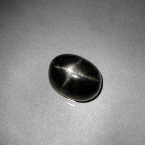 Diopsido estrella negro natural de 2,38 ct, corte óvalo, opaco