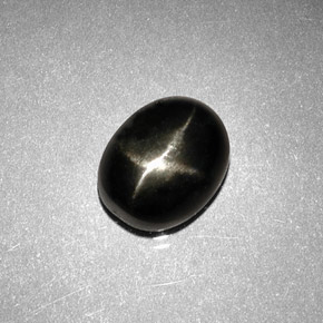 Diopsido estrella negro natural de 2,63 ct, corte óvalo, opaco