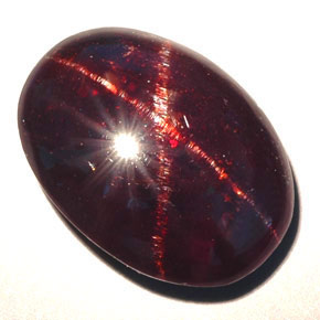 Granate estrella negro natural de 15,79 ct, corte óvalo, opaco