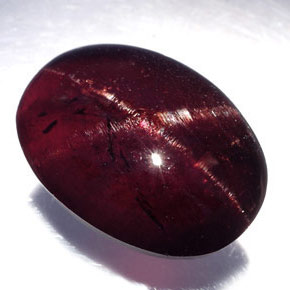 Granate estrella negro natural de 19,80 ct, corte óvalo, opaco