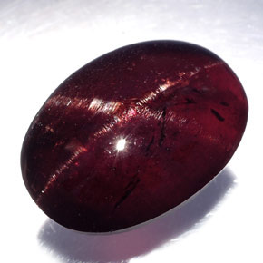Granate estrella negro natural de 19,80 ct, corte óvalo, opaco