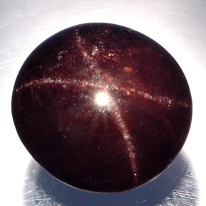 Granate estrella negro natural de 21,50 ct, corte óvalo, opaco