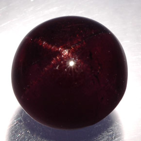 Granate estrella negro natural de 10,82 ct, corte redondo, opaco