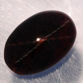 Granate estrella negro natural de 3,87 ct, corte óvalo, translúcido