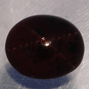 Granate estrella negro natural de 5,02 ct, corte óvalo, translúcido