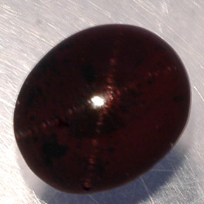 Granate estrella negro natural de 5,02 ct, corte óvalo, translúcido
