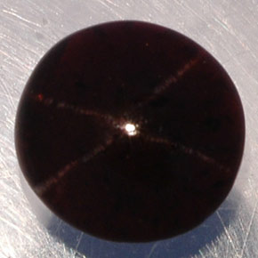 Granate estrella negro natural de 4,36 ct, corte redondo, translúcido